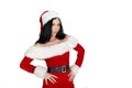Beautiful girl Santa Claus with dark hair in suit on white background. Insulations. Royalty Free Stock Photo