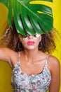 Beautiful Girl selfie with a smartphone. Beautiful young African American woman with afro hairstyle . Summer concept Royalty Free Stock Photo