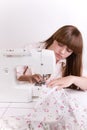 Beautiful girl sewing (vert) Royalty Free Stock Photo