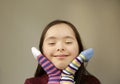 Beautiful girl smiling with different socks Royalty Free Stock Photo