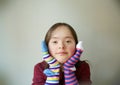 Beautiful girl smiling with different socks Royalty Free Stock Photo