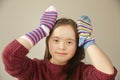 Beautiful girl smiling with different socks Royalty Free Stock Photo