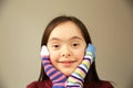 Beautiful girl smiling with different socks Royalty Free Stock Photo