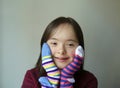 Beautiful girl smiling with socks Royalty Free Stock Photo