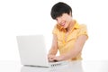 Beautiful girl smiling while using laptop Royalty Free Stock Photo