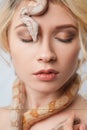 Beautiful girl and the snake Boa constrictors Royalty Free Stock Photo