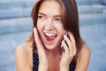 Beautiful girl speaking on telephone with happy and surprised ex Royalty Free Stock Photo