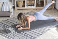 Beautiful girl sport at home . Fitness exercise, abs , smart training, exercise, home workout - push up balanced position for heal