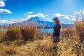 Beautiful girl standing at kawaguchiko lake with view of Fuji mountain, Autumn in Japan Royalty Free Stock Photo