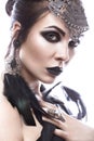 Beautiful girl in style of black queen. Image for a Halloween. Photos shot in the studio Royalty Free Stock Photo