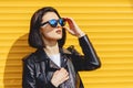 Beautiful girl sunglasses on bright yellow background Royalty Free Stock Photo