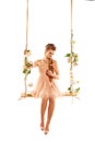 Beautiful girl swinging Royalty Free Stock Photo