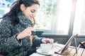 Beautiful girl taking a photo for social network with smartphone Royalty Free Stock Photo