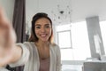 Beautiful Girl Taking Selfie Portrait Photo In Bedroom In Morning Royalty Free Stock Photo