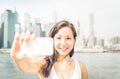 Beautiful girl taking selfie with smart phone Royalty Free Stock Photo