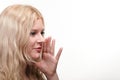 Beautiful girl talking speaking out hands mouth white background