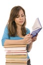 Beautiful girl thoughtfully reading a book Royalty Free Stock Photo