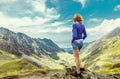 Beautiful girl on top of the mountain Royalty Free Stock Photo