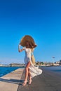 Beautiful girl tourist walking at Spetses marina seaport, Greece Royalty Free Stock Photo