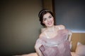 Beautiful girl tries on a pink wedding dress Royalty Free Stock Photo