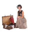 Beautiful girl with umbrella and old suitcase Royalty Free Stock Photo