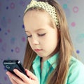 Beautiful girl using mobile phone Royalty Free Stock Photo