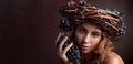 Beautiful girl with vine wreath and blue grapes Royalty Free Stock Photo