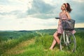 Beautiful girl with vintage bike outdoor, Tuscany summer time Royalty Free Stock Photo