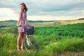 Beautiful girl with vintage bike outdoor, Tuscany summer time Royalty Free Stock Photo