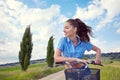 Beautiful girl with vintage bike outdoor, Tuscany summer time Royalty Free Stock Photo
