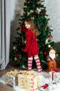 Beautiful girl is waiting Christmas and New year