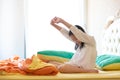 Beautiful girl waking up in her bed,Asian girl smiling and stretching,healthy lifestyle,wellness concept Royalty Free Stock Photo