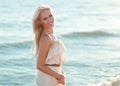 Beautiful girl walking down the beach Royalty Free Stock Photo