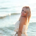 Beautiful girl walking down the beach Royalty Free Stock Photo