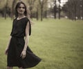 Beautiful girl walking in a forest