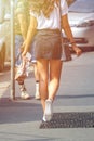 Beautiful girl wearing black mini dress and walking on Milan cit Royalty Free Stock Photo