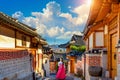 Beautiful girl wearing Korean traditional hanbok at Bukchon Hanok Village. Traditional Korean style architecture in Seoul,Korea Royalty Free Stock Photo