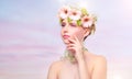 Beautiful girl wearing wreath of flowers