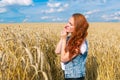 Beautiful girl in a wheat field. Royalty Free Stock Photo