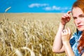 Beautiful girl in a wheat field. Royalty Free Stock Photo