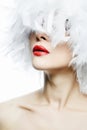 Beautiful Girl in white feathers Hat. Make-up Royalty Free Stock Photo