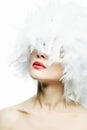 Beautiful Girl in white feathers Hat. Make-up Royalty Free Stock Photo