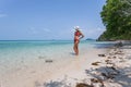 Beautiful Girl White Hair and red swimmingsuit staying on beach, relaxing enjoy freedom. Royalty Free Stock Photo