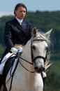 Beautiful girl on a white horse