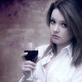 Beautiful girl in white shirt with red wine Royalty Free Stock Photo