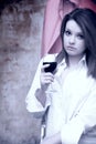 Beautiful girl in white shirt with red wine Royalty Free Stock Photo