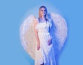 Beautiful girl with white wings. Valentine angel woman. Valentines Day. Royalty Free Stock Photo