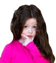 Beautiful girl 4-5 years old with long brown hair. The child is puzzled. In thought. Isolated