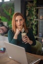 Girl hanging out and typing on laptop and relaxing