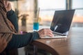 Girl typing on laptop and relaxing Royalty Free Stock Photo